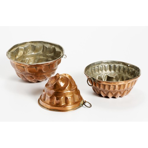 65 - THREE COPPER JELLY MOULDS