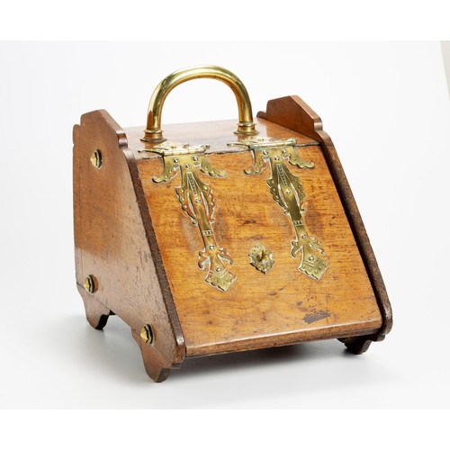 70 - AN OAK AND BRASS-MOUNTED COAL SCUTTLE