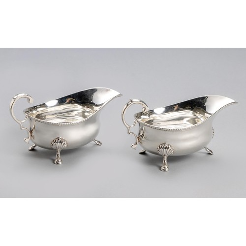 1030 - A PAIR OF EDWARD VII SILVER SAUCE BOATS, EDWARD BARNARD AND SONS, LONDON, 1904