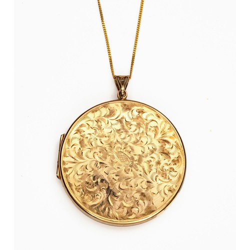 901 - A 9CT GOLD LOCKET