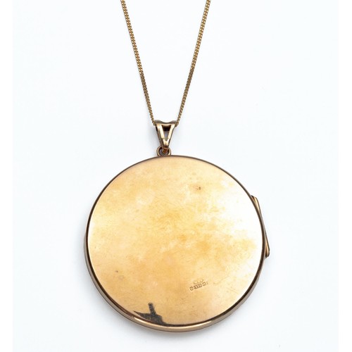 901 - A 9CT GOLD LOCKET