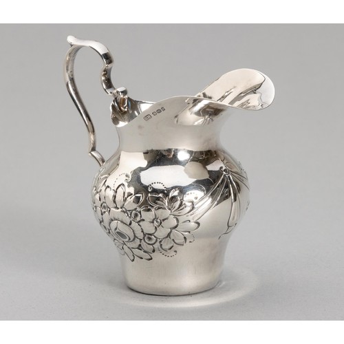 1084 - A GERMAN SILVER MILK JUG, B MULLER AND SON, IMPORT MARKS FOR CHESTER, CIRCA 1900