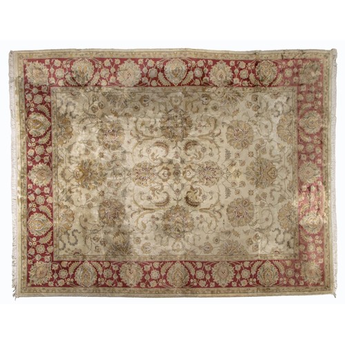 34 - A WOOL AND SILK INDIAN CARPET