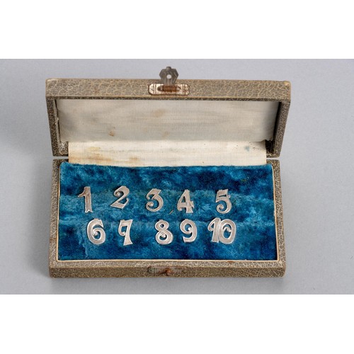 1087 - A CASED SET OF TEN DUTCH SILVER PLACE SETTING NUMBERS, 19TH CENTURY