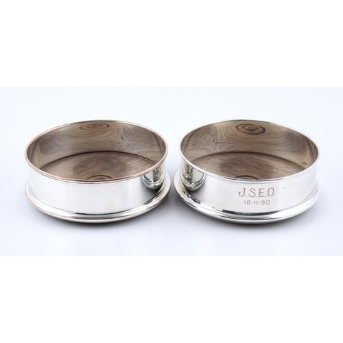 400 - A PAIR OF ELECTROPLATE WINE COASTERS