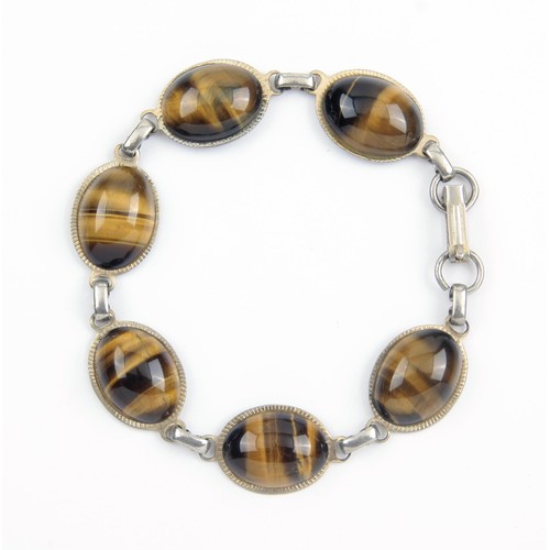 1747 - A SILVER AND TIGERS EYE BRACELET