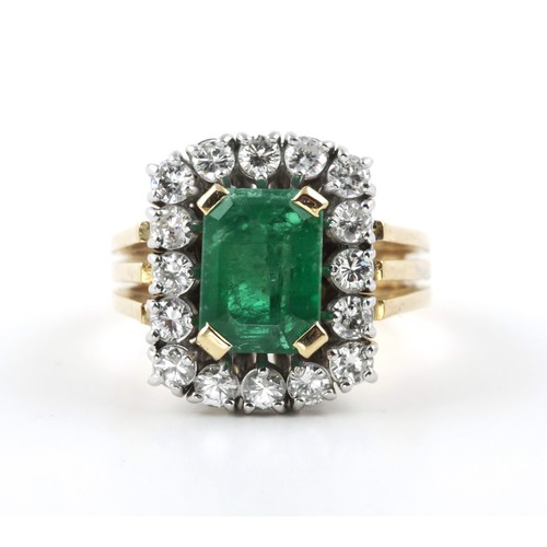 1430 - A 4CT EMERALD AND DIAMOND RING