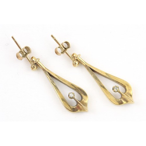 1721 - A PAIR OF GOLD AND DIAMOND EARRINGS