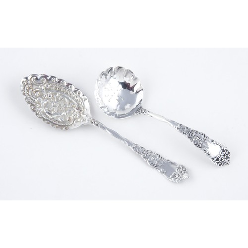 104 - A VICTORIAN SILVER BERRY SPOON AND SUGAR SIFTER, LEVI AND SOLOMON, LONDON, 1899