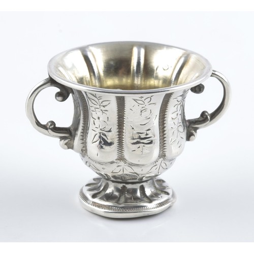 325 - A SILVER MINIATURE CHAMPAGNE COOLER, MAKER AND DATE MARKS RUBBED