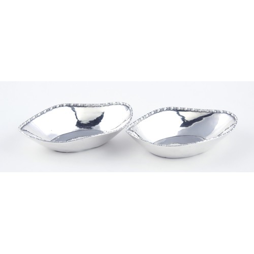 334 - A PAIR OF SILVER NUT DISHES, MAKER AND DATE MARKS RUBBED