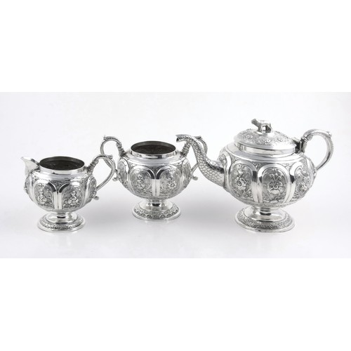 379 - AN INDIAN SILVER THREE-PIECE TEA SERVICE