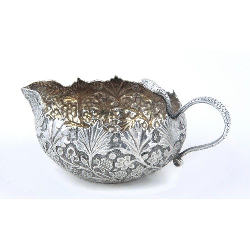 376 - A BURMESE SILVER SAUCE BOAT, MODERN