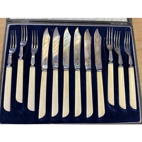 391 - AN ELECTROPLATED SET OF BONE HANDLED CUTLERY