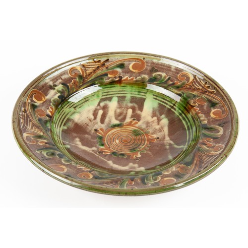 517 - AN EARTHENWARE PLATE