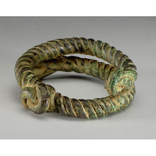 102 - A BOCHIE TWISTED CURRENCY BRACELET, IGBO PEOPLE, NIGERIA