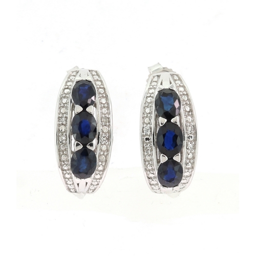 223 - A PAIR OF SAPPHIRE AND DIAMOND EARRINGS