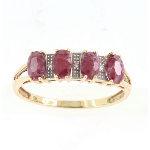 243 - A DIAMOND AND RUBY RING