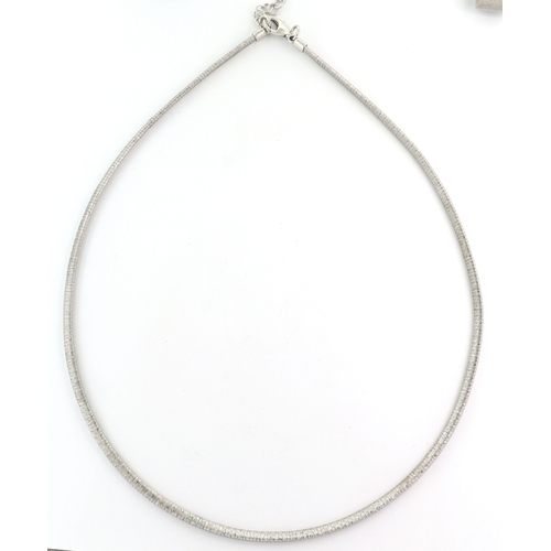 162 - A SILVER AND WHITE GOLD NECKLACE