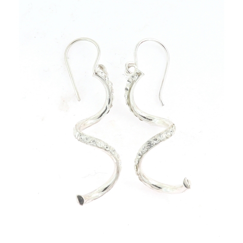 221 - A PAIR OF SWAROVSKI STYLE SILVER DROP EARRINGS