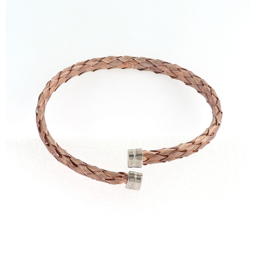 190 - A SILVER AND ROSE GOLD OPEN BANGLE