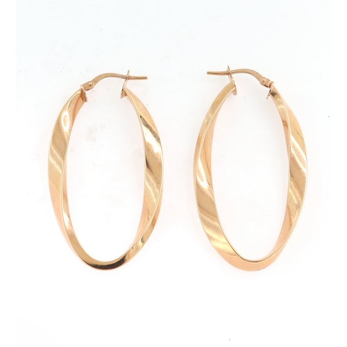 211 - A PAIR OF ROSE GOLD TWISTED EARRINGS