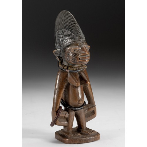 257 - AN IBEJI FIGURE, YORUBA, NIGERIA