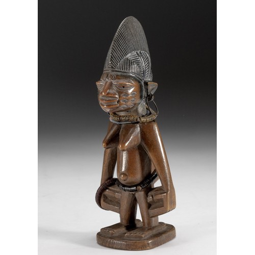 257 - AN IBEJI FIGURE, YORUBA, NIGERIA