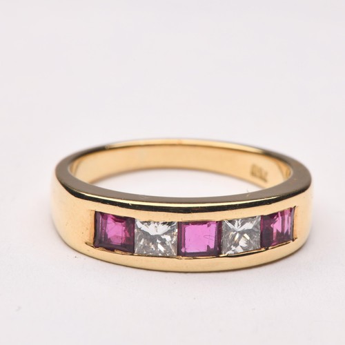 227 - A RUBY AND DIAMOND ETERNITY STYLE RING