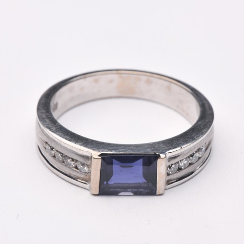 230 - AN IOLITE AND DIAMOND DRESS RING