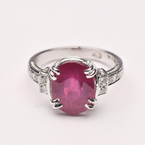 241 - A RUBY AND DIAMOND DRESS RING