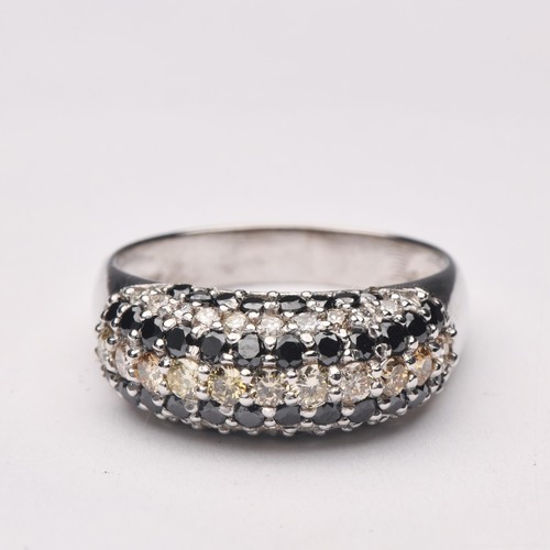 247 - A DIAMOND BOMBÉ STYLE DRESS RING