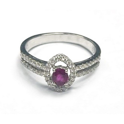 244 - A DIAMOND AND RUBY RING