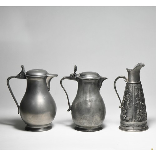 71 - TWO PEWTER JUGS AND AN EWER