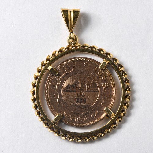 658 - A COIN PENDANT