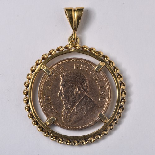 658 - A COIN PENDANT