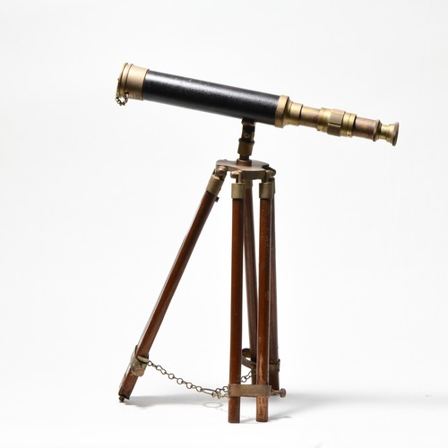 364 - A BRASS AND LEATHER-BOUND TELESCOPE ON STAND