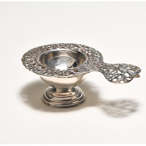 854 - AN ELECTROPLATE TEA STRAINER, LONDON, MODERN