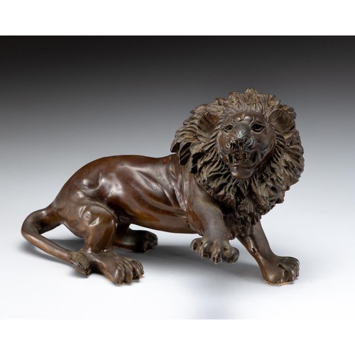 1098 - A BRONZE FIGURE OF A LION