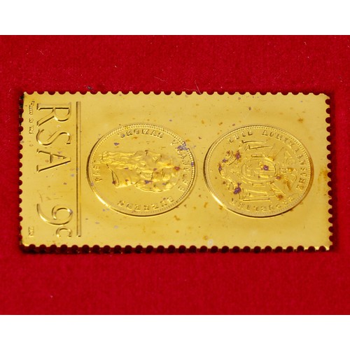 A 1974 18CT GOLD BURGERSPOND 9C STAMP REPLICA