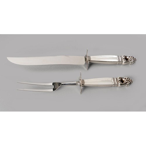 820 - A SILVER CARVING SET