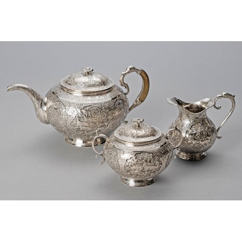 840 - A PERSIAN SILVER THREE PIECE TEA SERVICE, MAKER AND DATE MARKS RUBBED