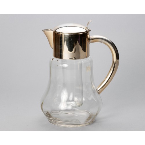 861 - A GLASS AND SILVER PLATE PITCHER