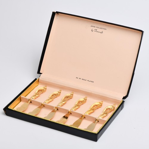 859 - A CASED SET OF GOLD-PLATED BUTTER KNIVES