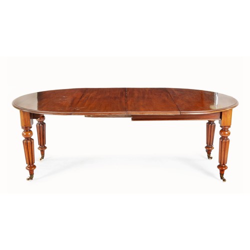 307 - A WILLIAM IV MAHOGANY EXTENDING DINING TABLE