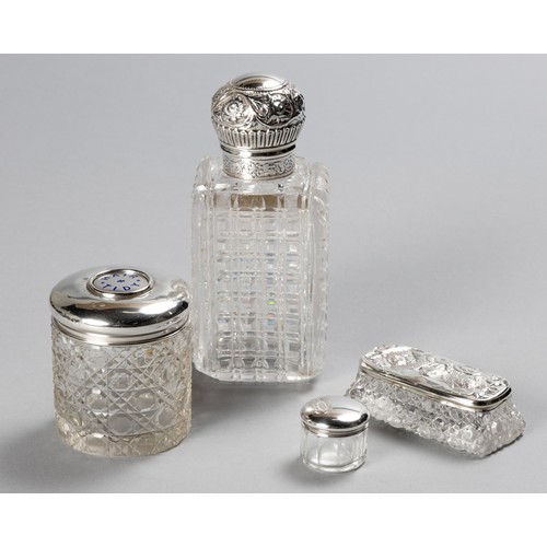 229 - A SILVER-MOUNTED AND GLASS SCENT BOTTLE AND THREE SILVER-MOUNTED AND GLASS DRESSING TABLE JARS, BIRM... 