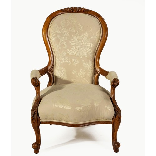 614 - A VICTORIAN WALNUT ARMCHAIR