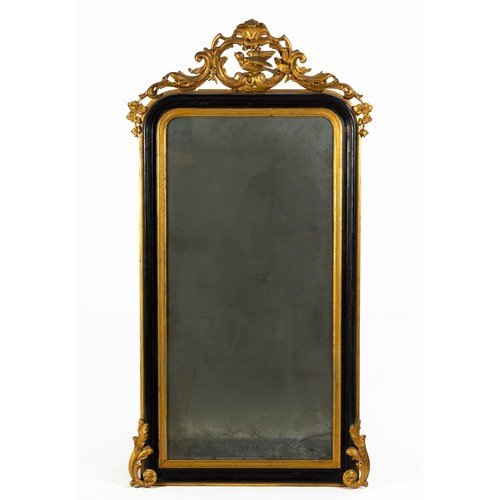 661 - AN EBONISED AND GILTWOOD MIRROR, 19TH CENTURY