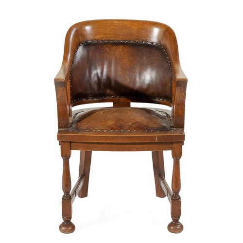 625 - A WALNUT AND LEATHER UPHOLSTERED ARMCHAIR