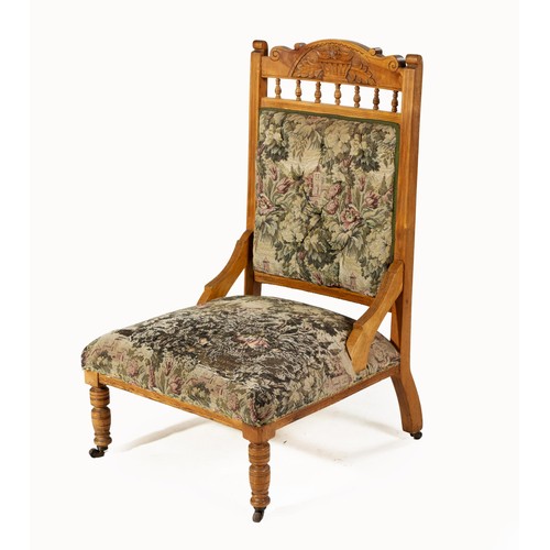 618 - A MAHOGANY NURSING CHAIR